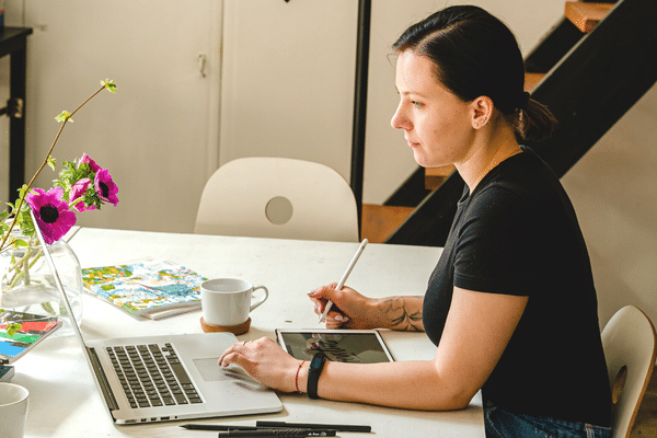 graphic designer working on her laptop