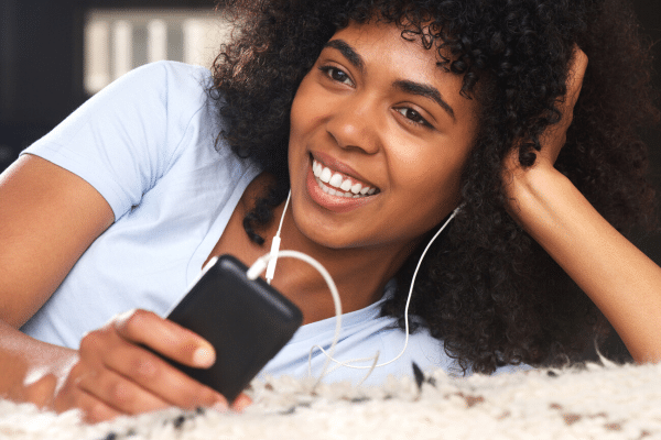 woman listening to podcast