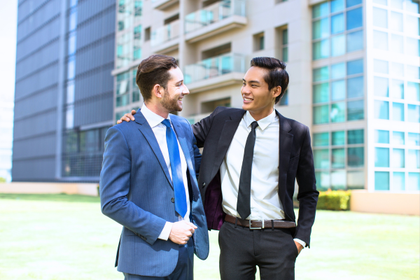 two male real estate agents talking